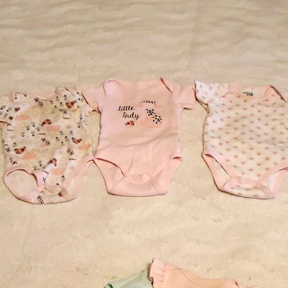 3 Chick Pea onsies 3/6months. Pink, white and pastel colors. 3 snap bottom.
